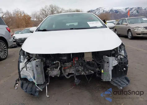 2021 Toyota Corolla Hybrid Le from USA, damaged, VIN JTDEAMDE7MJ021511